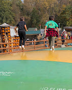 Kids on the jumping pillows at the Long Family Orchard Fun Farm